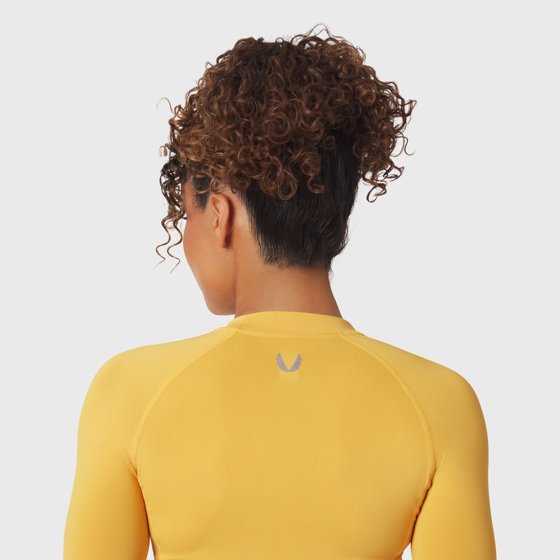 W058. LYCRA® ADAPTIV Baselayer Longsleeve Amber | ASRV US