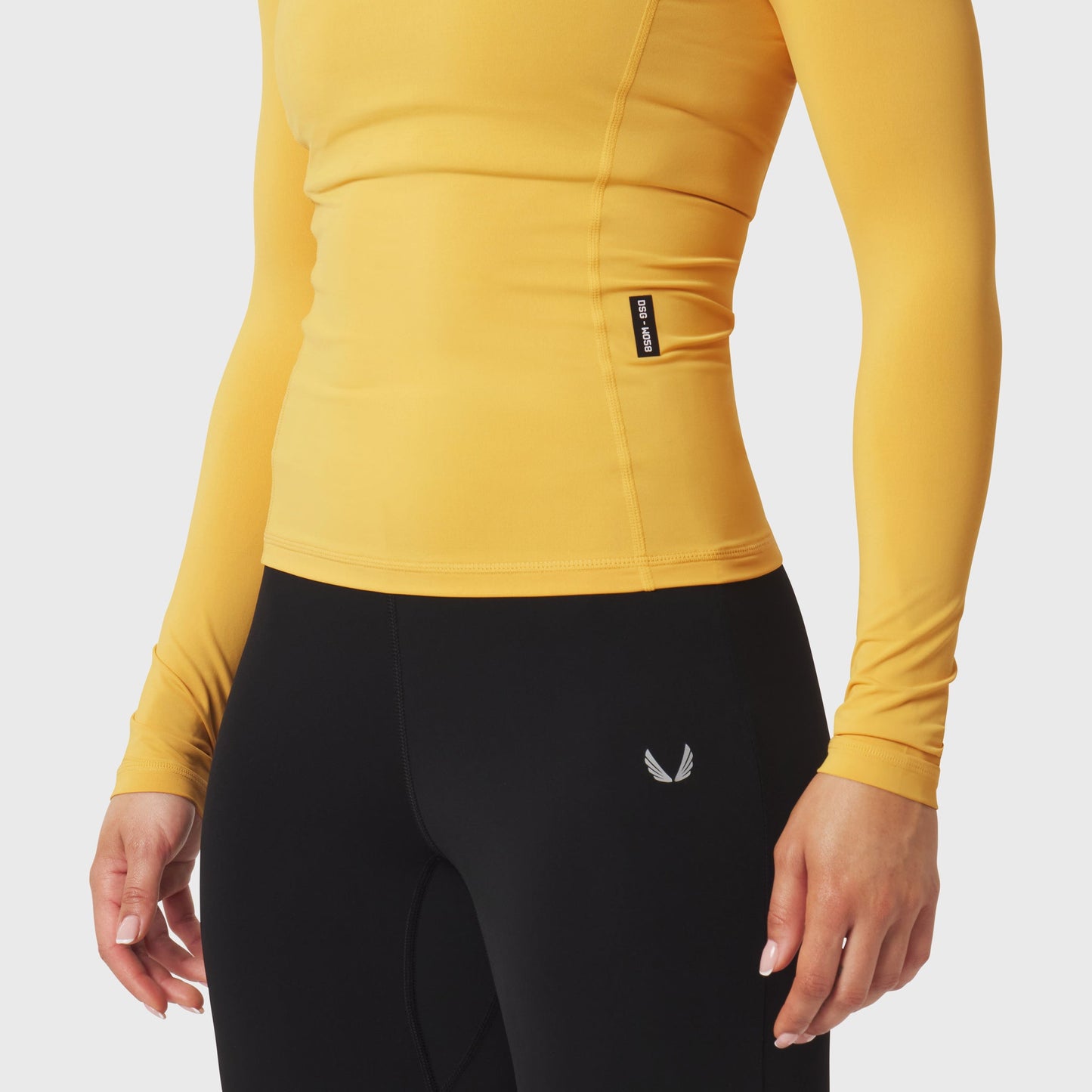 W058. LYCRA® ADAPTIV Baselayer Longsleeve Amber | ASRV US